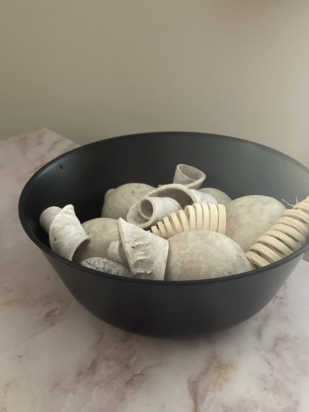 black decor bowl with scented filler